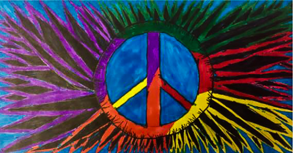 Peace sign art painted by a student using purple, blue, green, red, yellow